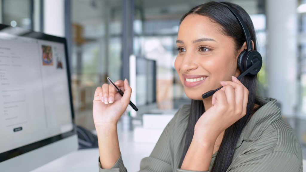 A woman at work with genuine smile