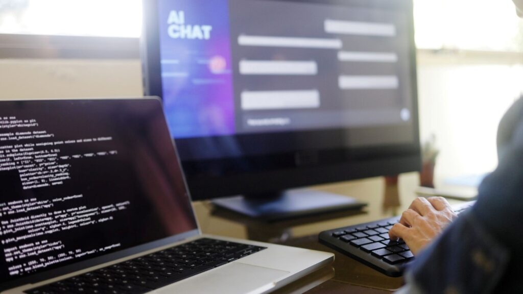 A person typing on a keyboard
